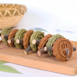 Load image into Gallery viewer, Hanging string toy strung with organic apple branch twigs and textured hay biscuit rings