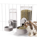 Load image into Gallery viewer, Automatic rabbit gravity food and water dispenser set mounted on a wire cage, showing a Holland Lop rabbit eating pellets from the wide mess-free bowl.