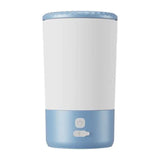 Load image into Gallery viewer, Electric automatic rabbit paw cleaner cup in light blue, soft silicone foot washer for pet bunny grooming and hygiene.