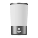 Load image into Gallery viewer, Dark grey and white electric rabbit paw cleaner cup with soft silicone brush for gentle indoor bunny foot washing and sore hocks care.
