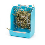 Load image into Gallery viewer, A bright blue rabbit hay feeder dispenser with a metal grid and a built-in tray to catch spillage. This hanging hay rack is a great choice for keeping a bunny's living space tidy and clean