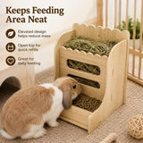 Load image into Gallery viewer, Bunny eating from a wooden rabbit hay feeder with lower pellet tray in an indoor pet area