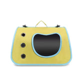 Load image into Gallery viewer, Soft-sided bunny travel carrier in pastel yellow with sky blue piping, front peek-a-boo window, and side air vents.