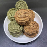Load image into Gallery viewer, Stack of cute bunny-face stamped timothy hay and carrot cakes on a ceramic plate