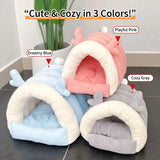 Load image into Gallery viewer, Stack of cute indoor bunny cave beds displayed in three available pastel colors: Playful Pink, Dreamy Blue, and Cozy Gray.