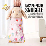Load image into Gallery viewer, Pet parent safely holding an escape-proof bunny burrito grooming wrap with secure hook and loop closure keeping the rabbit calm