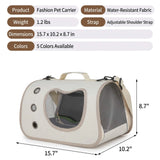Load image into Gallery viewer, Product size chart and specifications for the bunny carrier, showing dimensions of 15.7 by 10.2 by 8.7 inches and water-resistant fabric details.