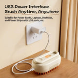 Load image into Gallery viewer, USB rechargeable electronic rabbit grooming brush plugged into a wall outlet for cordless pet grooming.